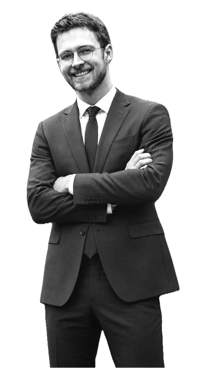 Black-and-white portrait of Johannes Roth in a suit